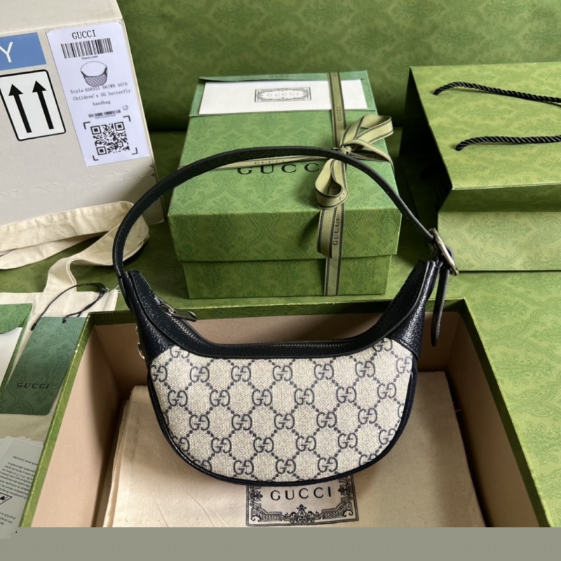 G*u*i top handle bags